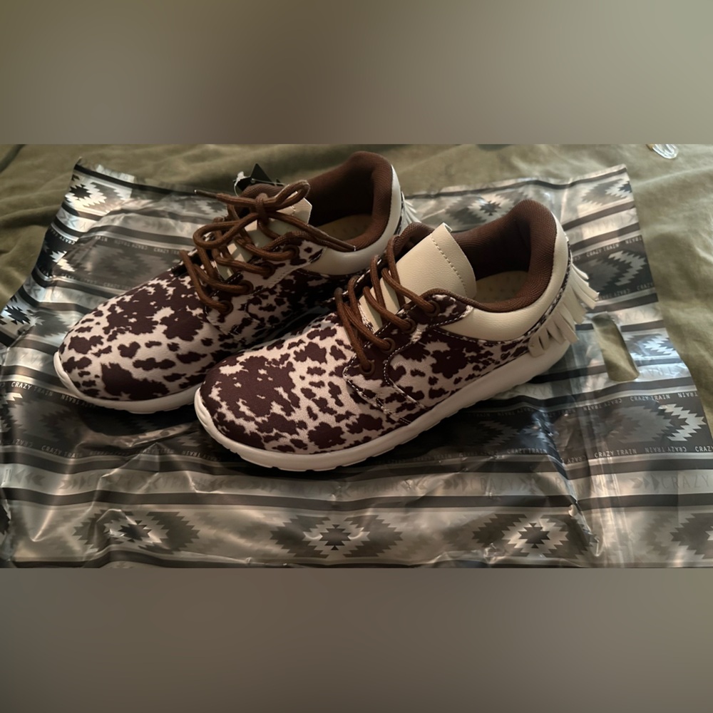 Crazy train cow print shoes